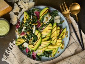 A photo of Grilled California Avocado Kale Caesar Salad