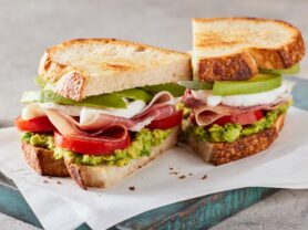 A photo of a Ham, Fresh Mozzarella and Avocado Sandwich