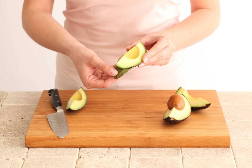 Peeling-avocado.jpg Peeling-avocado.jpg
