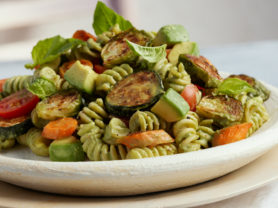 Bowl of pasta made with avocado pesto sauce