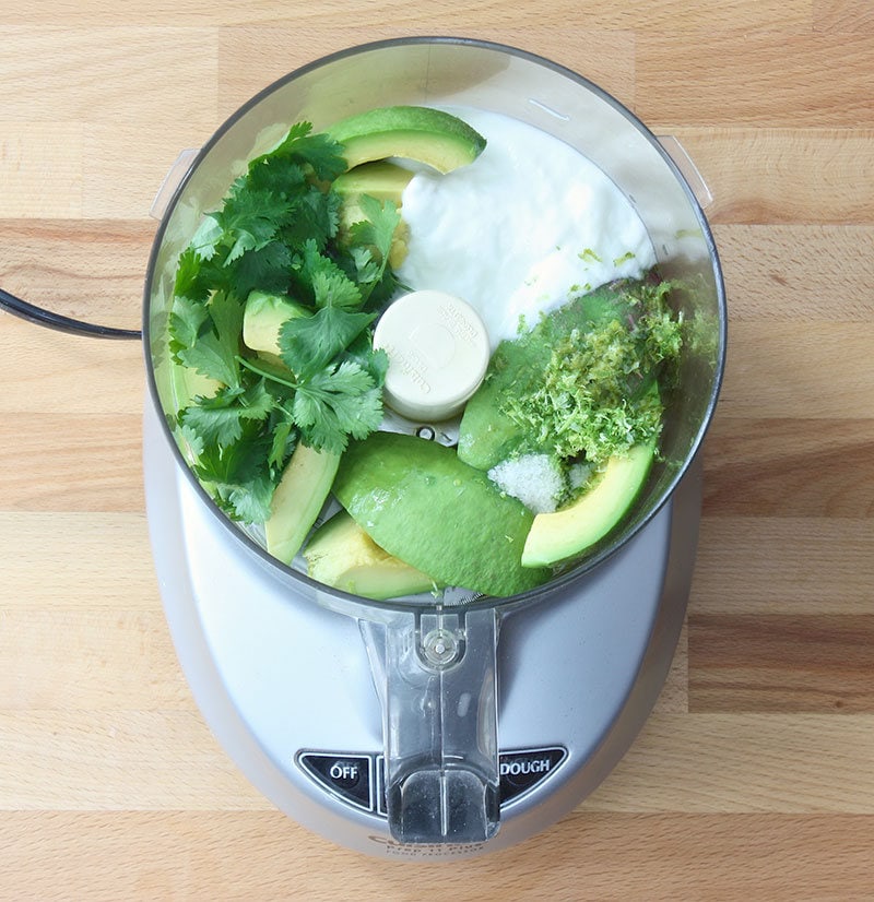 sauce-ingredients-in-food-processor.jpg Avocado sauce ingredients inside a food processor