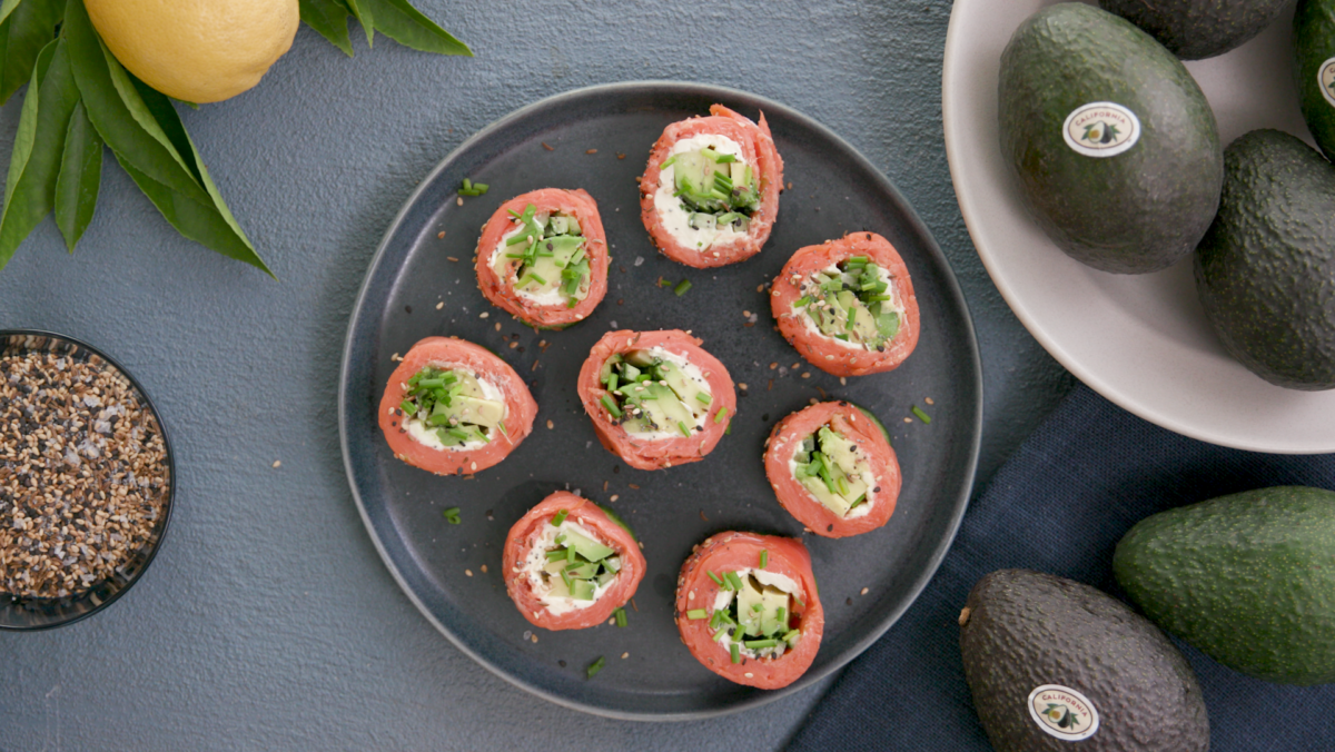Plate of cucumber avocado smoked salmon sushi